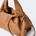 Braided top handle bag