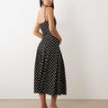 Mango – Maxikleid in Schwarz mit weißen Polka-Dots und schmalen Trägern