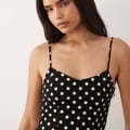 Mango – Maxikleid in Schwarz mit weißen Polka-Dots und schmalen Trägern