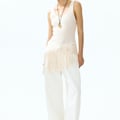 Asymmetrisches Top mit Fransenbesatz