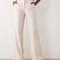 ASOS DESIGN – Snatch – Elegante Schlaghose in Creme