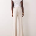 ASOS DESIGN – Snatch – Elegante Schlaghose in Creme