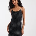 ASOS DESIGN – Gepunktetes Maxikleid mit Schwalbenschwanz