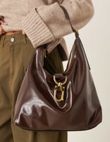 ASOS DESIGN – Weiche Tragetasche in Schokobraun mit auffälligem Schnallendetail