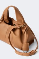 Braided top handle bag