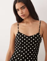 Mango – Maxikleid in Schwarz mit weißen Polka-Dots und schmalen Trägern