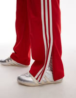 adidas Originals – Firebird – Trainingshose in Rot