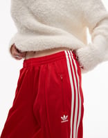 adidas Originals – Firebird – Trainingshose in Rot