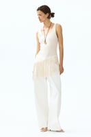 Asymmetrisches Top mit Fransenbesatz