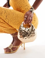 ASOS DESIGN hammered top handle clutch bag in gold