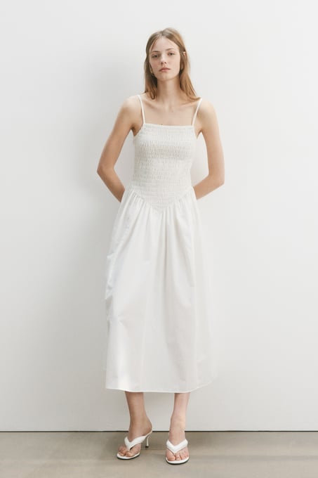 H&M Gesmoktes Kleid mit ausgestelltem Rockteil